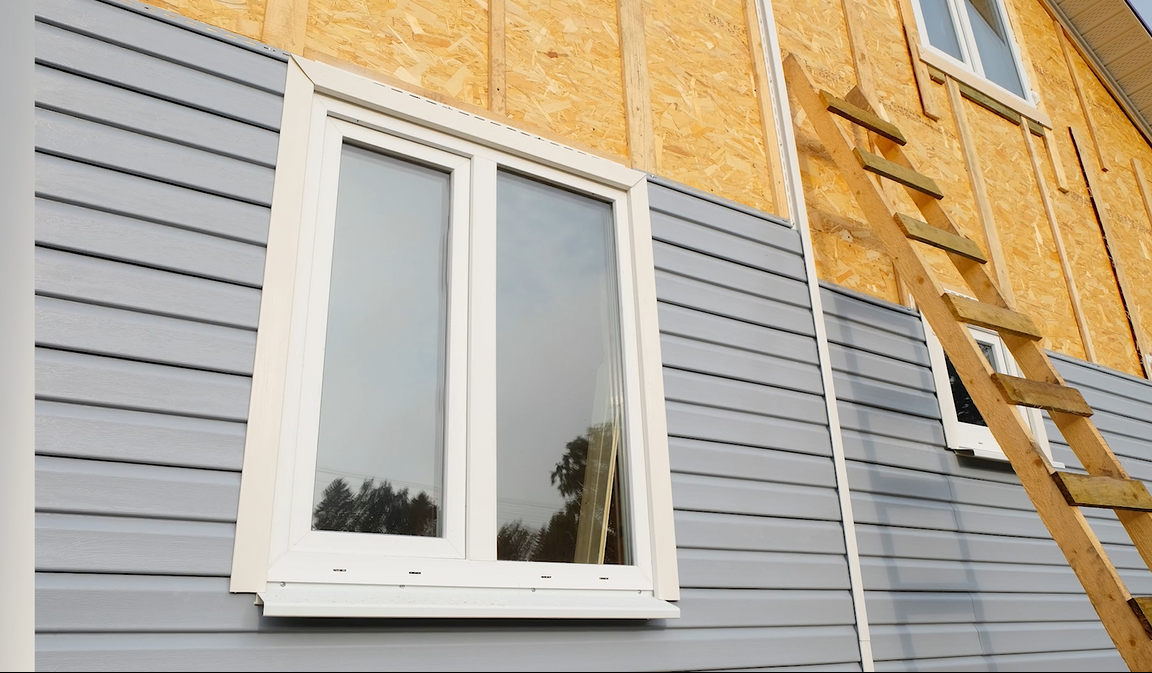 siding being installed on home